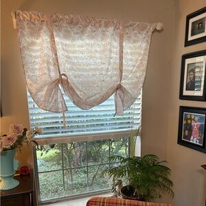 Chic Tie-Up Floral Curtain in Cream and light orange print. 52x45